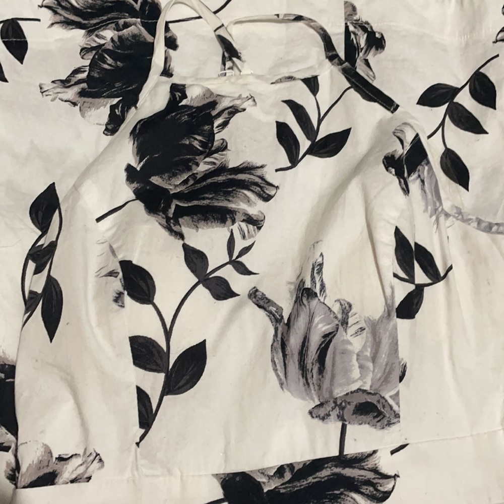 White halter dress with black floral pattern